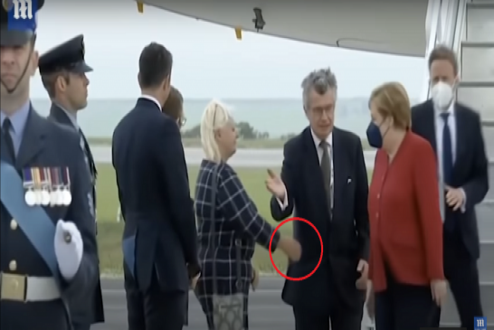 قيود كورونا تحرج ميركل في بريطانيا