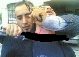 مسلحون من حزب الله  وأمل والقوميين يقاتلون مع الأسد
